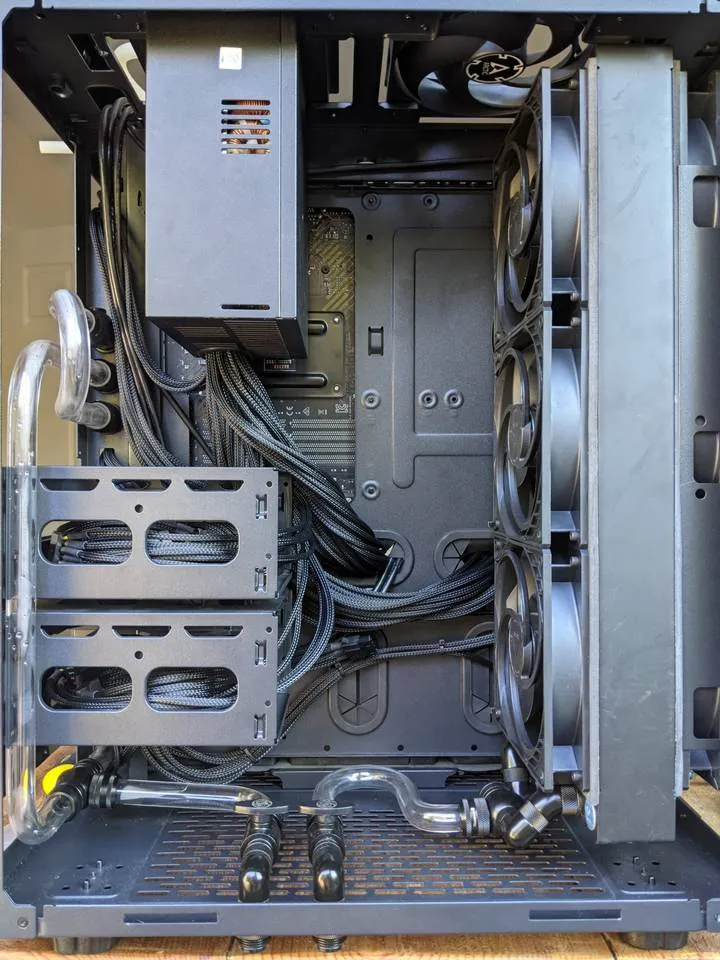 Hard drive cages reinstalled; cable ties trimmed