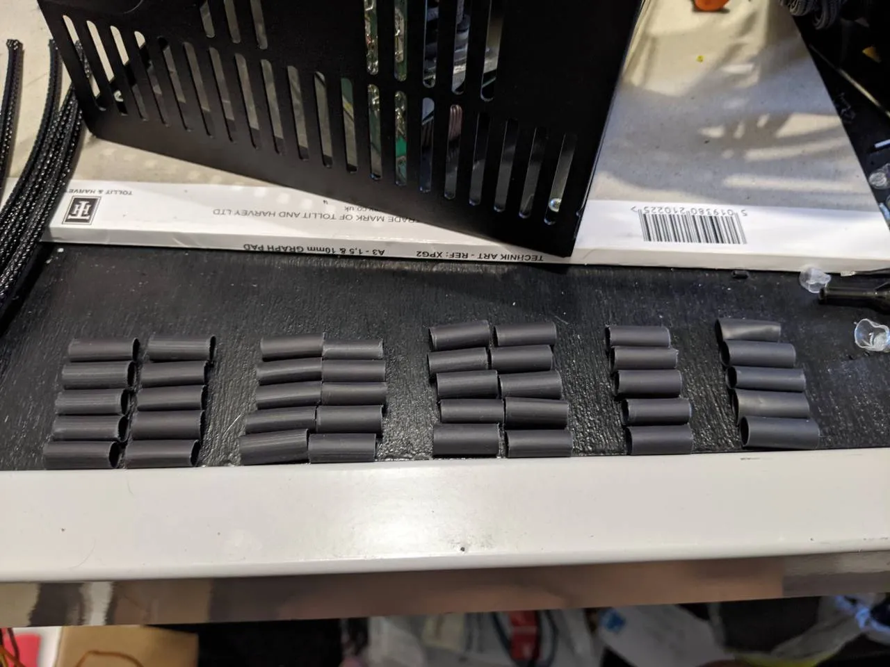 Black heatshrink, cut to 15mm