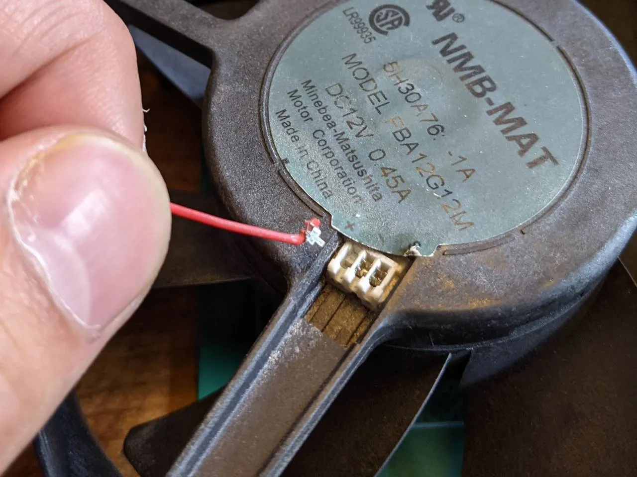 Fan connector, terminal ripped out, close-up