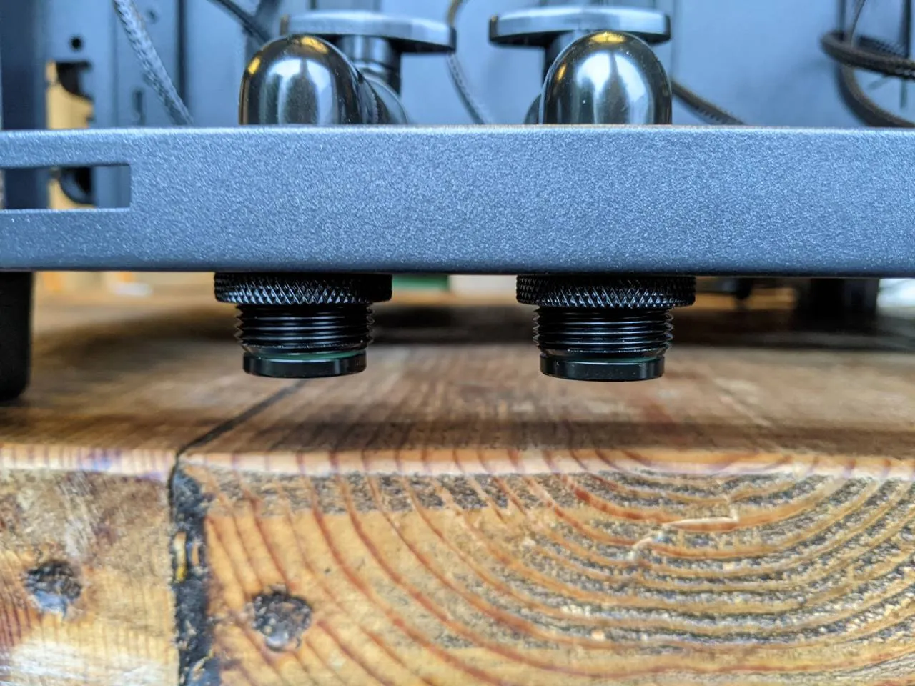Barrow pass-through fittings below case floor