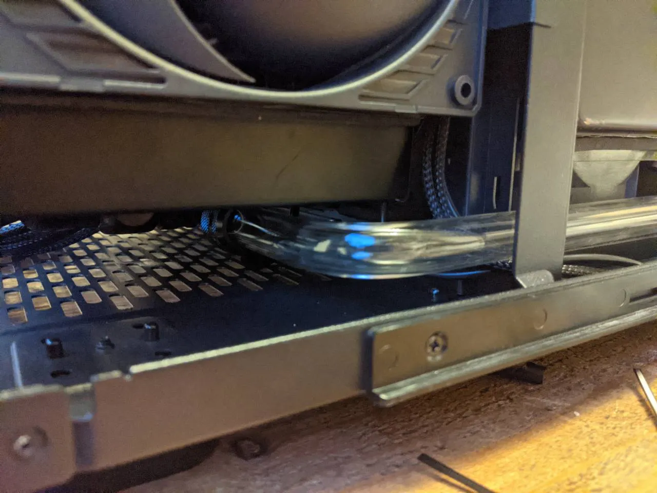 Tubing passes under the radiator