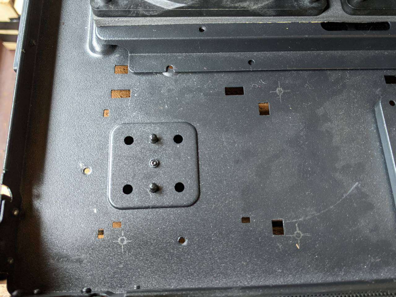 Marked out screw holes for GPU loop's pump-reservoir