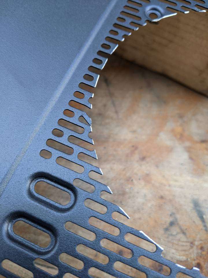 Rear panel mesh section bent